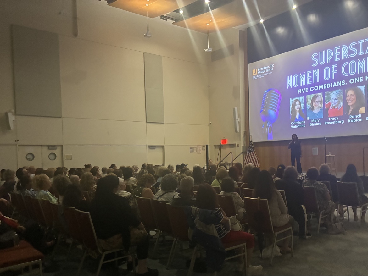 A large audience watching Supersized Women of Comedy at the Grushkin Center