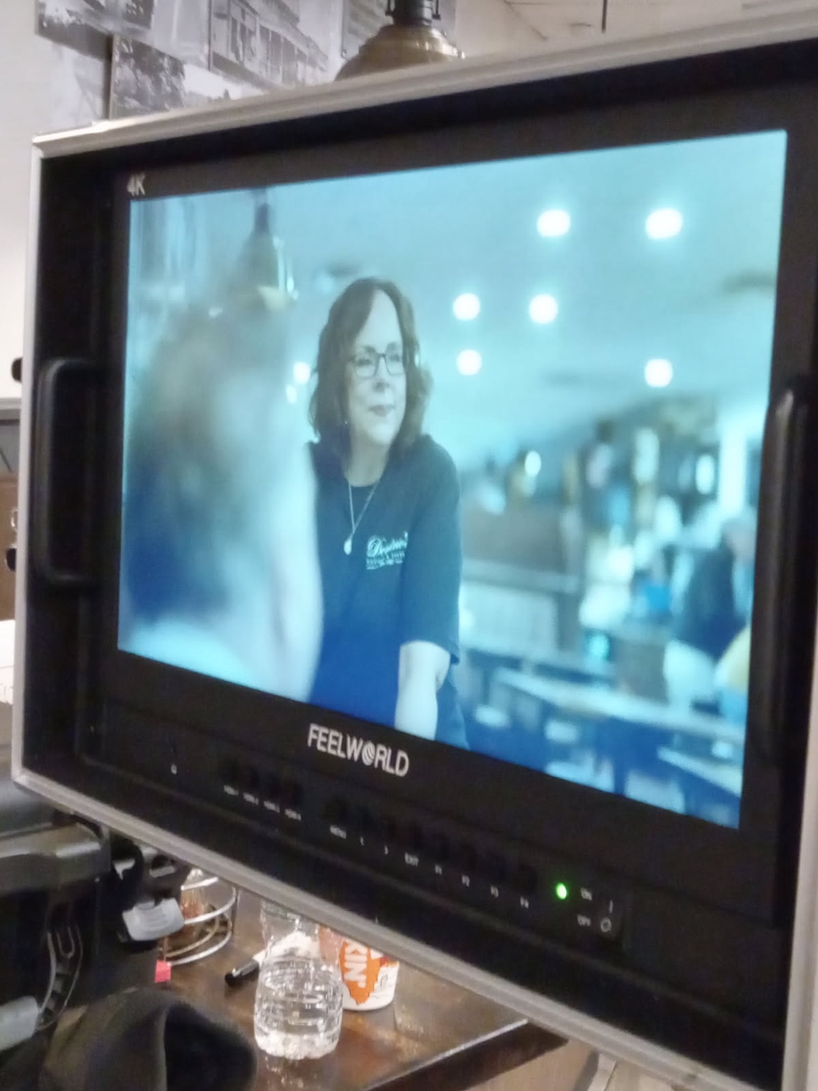 Mary Dimino on a Feelworld production monitor behind the scenes