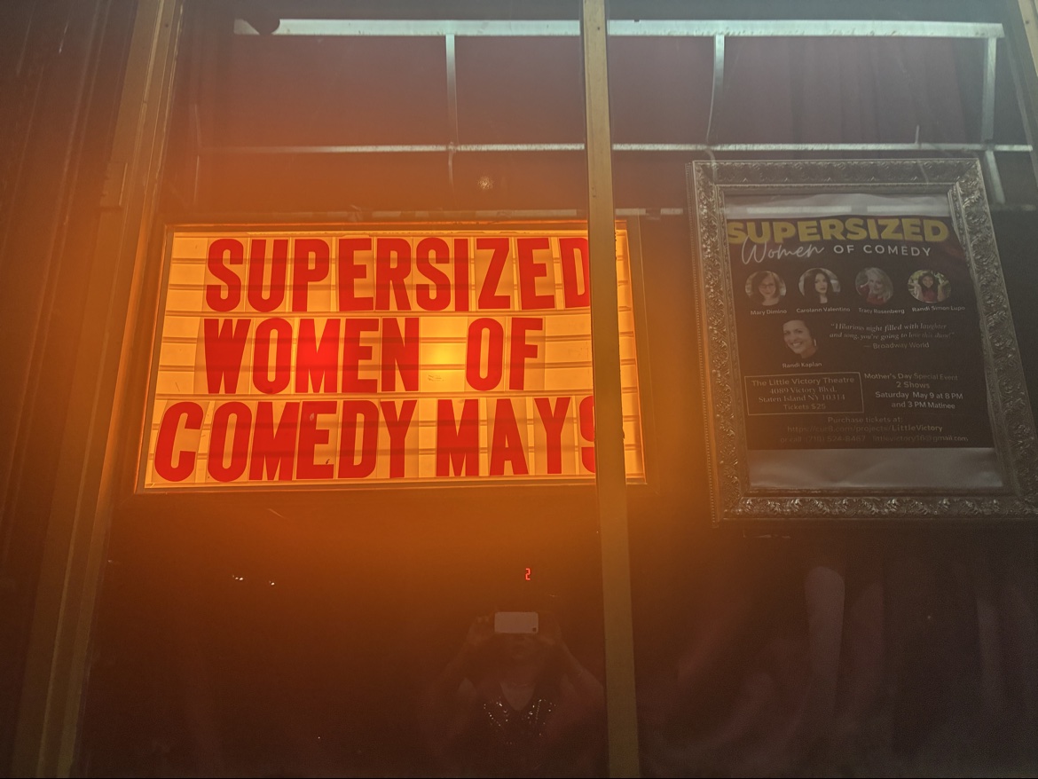 A theater marquee announcing Supersized Women of Comedy